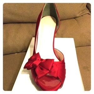 Red open toed dress shoes by David’s Bridal